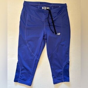 New‎ Balance purple crop leggings with elastic waist & draw string. Sz-M. O10